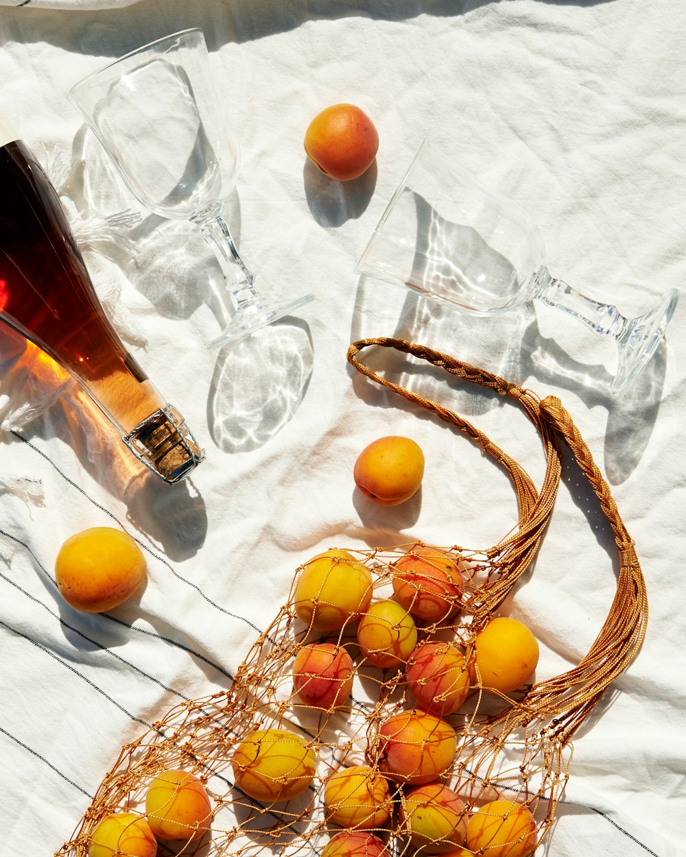 orange fruit on white textiles