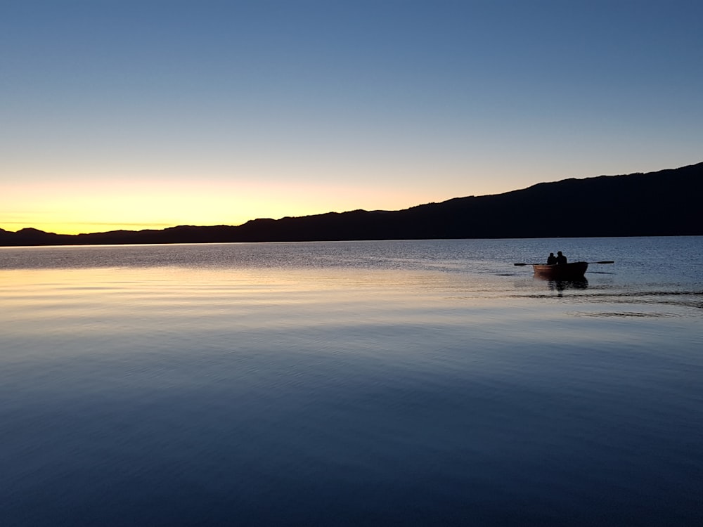 boat on body of water during daytime