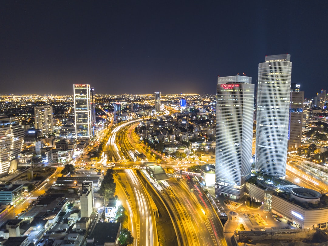 time-lapse photography of moving vehicles on road