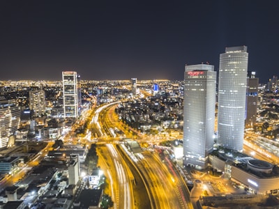 time-lapse photography of moving vehicles on road