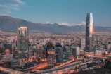 Panoramic view of Monterrey's modern skyline framed by surrounding mountains.