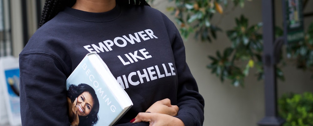 woman holding book