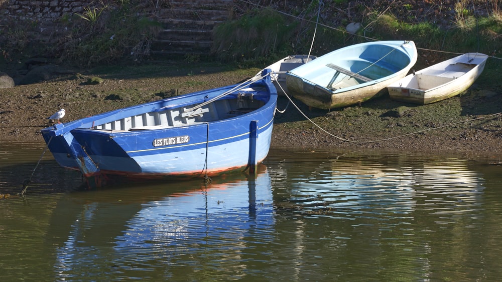 a couple of boats that are sitting in the water