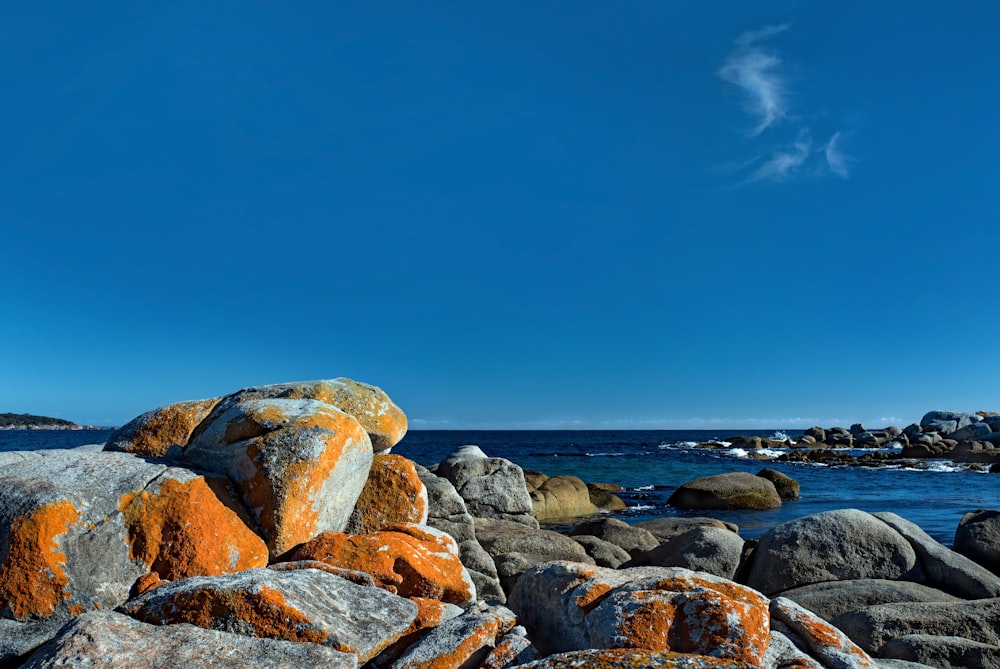 stone near body of water