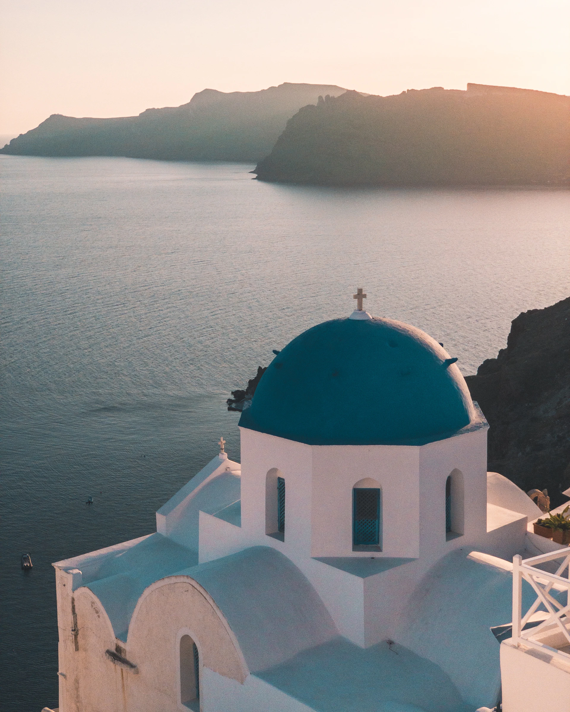 Crystal clear waters and dramatic coastline of Santorini, Greece