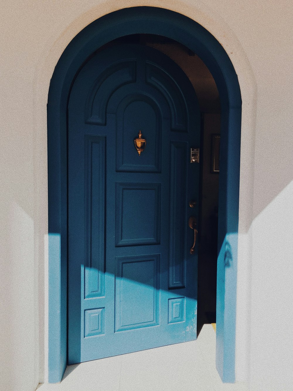blue wooden door opened