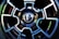 A close-up view of a car wheel featuring a distinctive and intricate alloy design with a shiny, reflective surface. The center cap prominently displays the letter 'R' within a polished emblem, surrounded by a symmetrical pattern that combines sleek black and metallic silver elements.