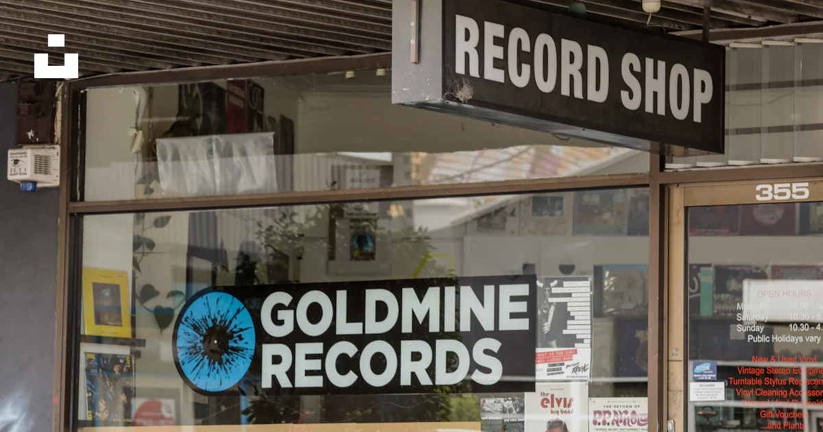 Record Section Signage Record shop store signage photo – Free Shop Image on Unsplash