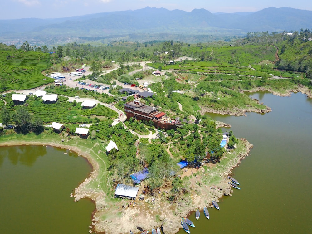 aerial view of houses across mountain