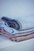 An assortment of linen products showcased in a hotel room.