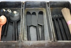 black wooden utensil trays