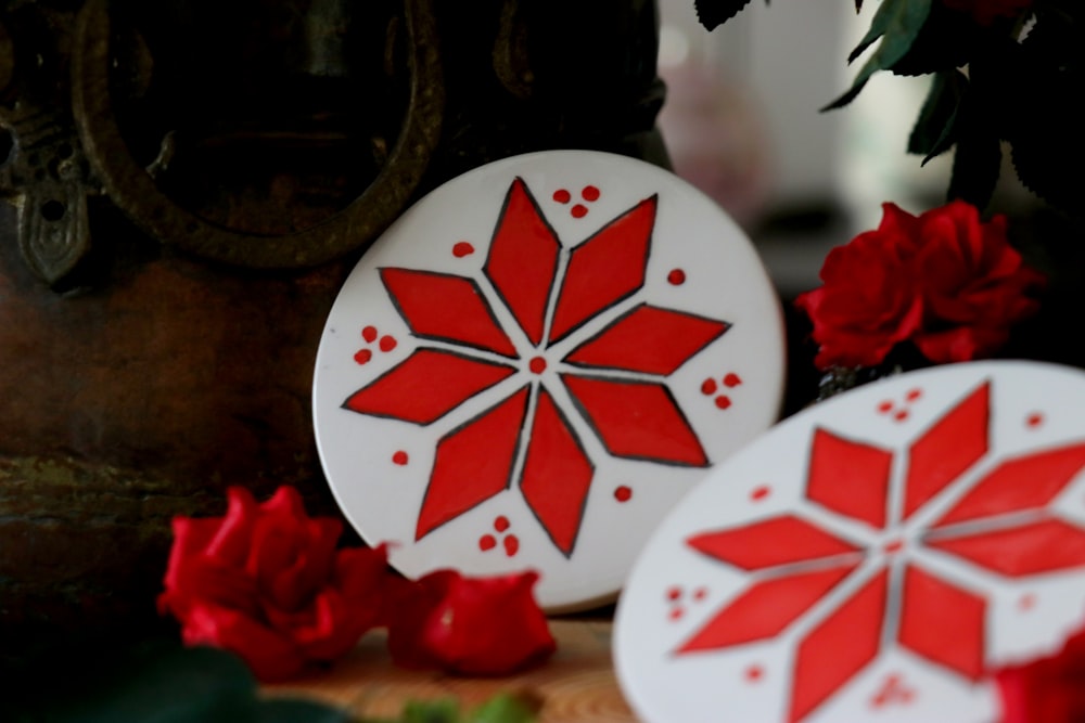 red and white flower pin-back button