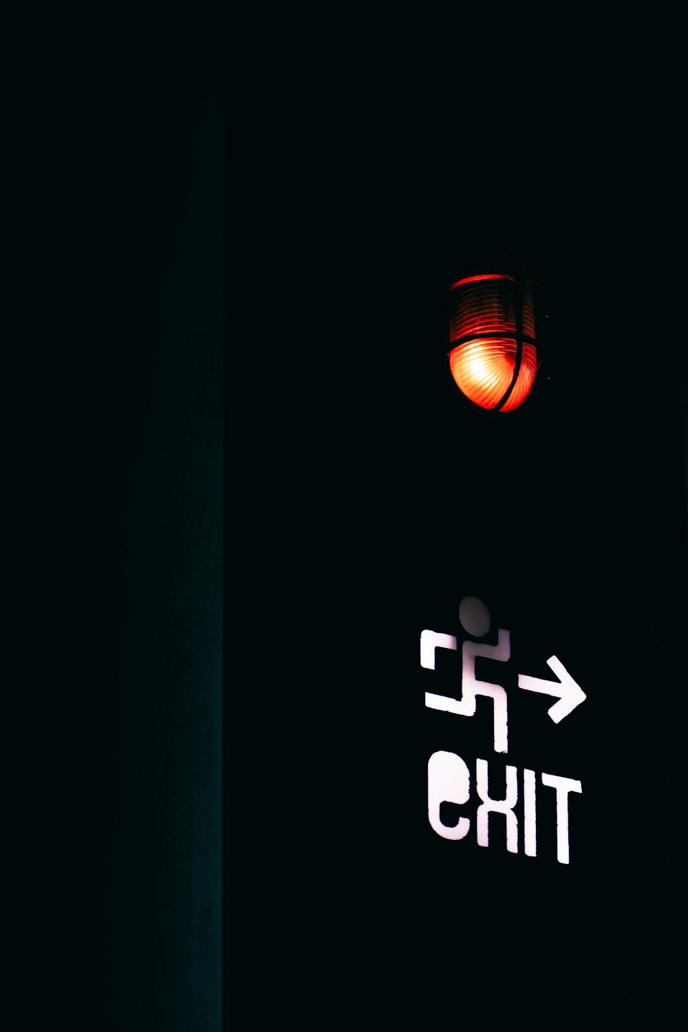 black and red Exit street sign