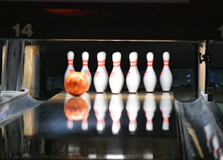 bowling ball going to hit bowling pins