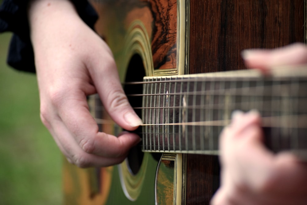 person playing guitar