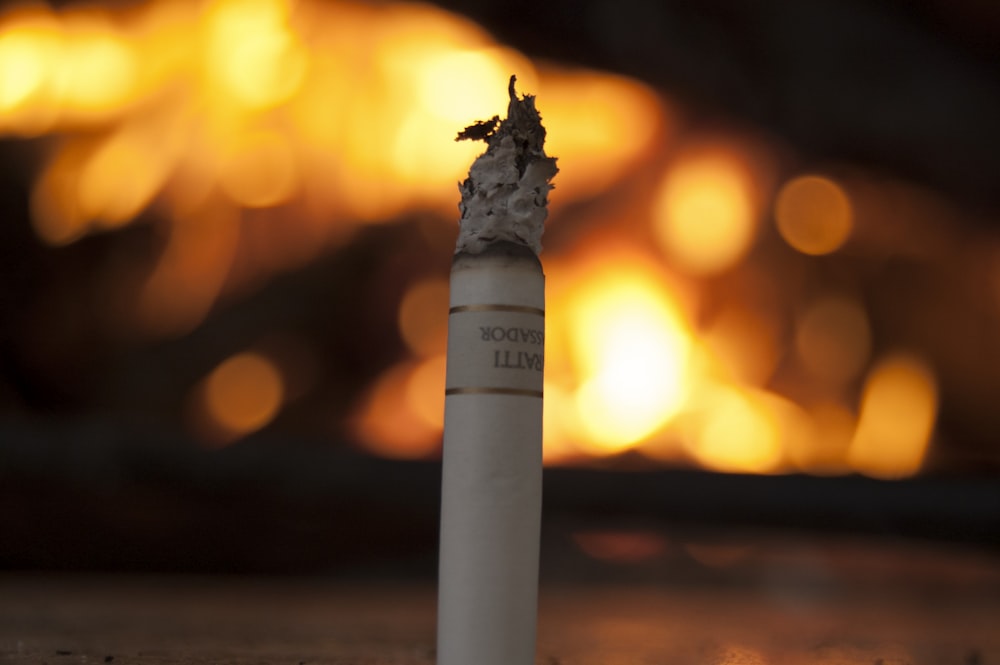 selective focus photography of burned cigarette stick