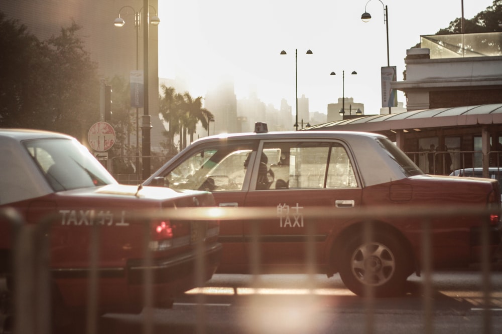 red car beside building