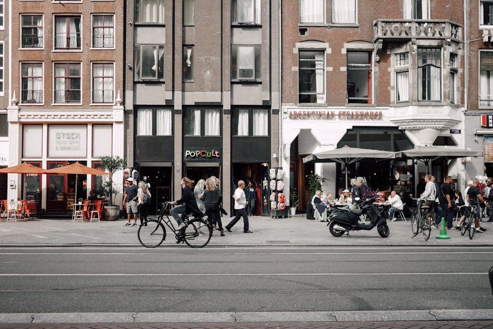 people near the road during daytime