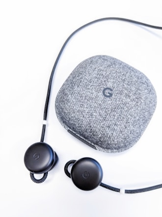 A sleek pair of Premium earbuds showcasing advanced audio technology.