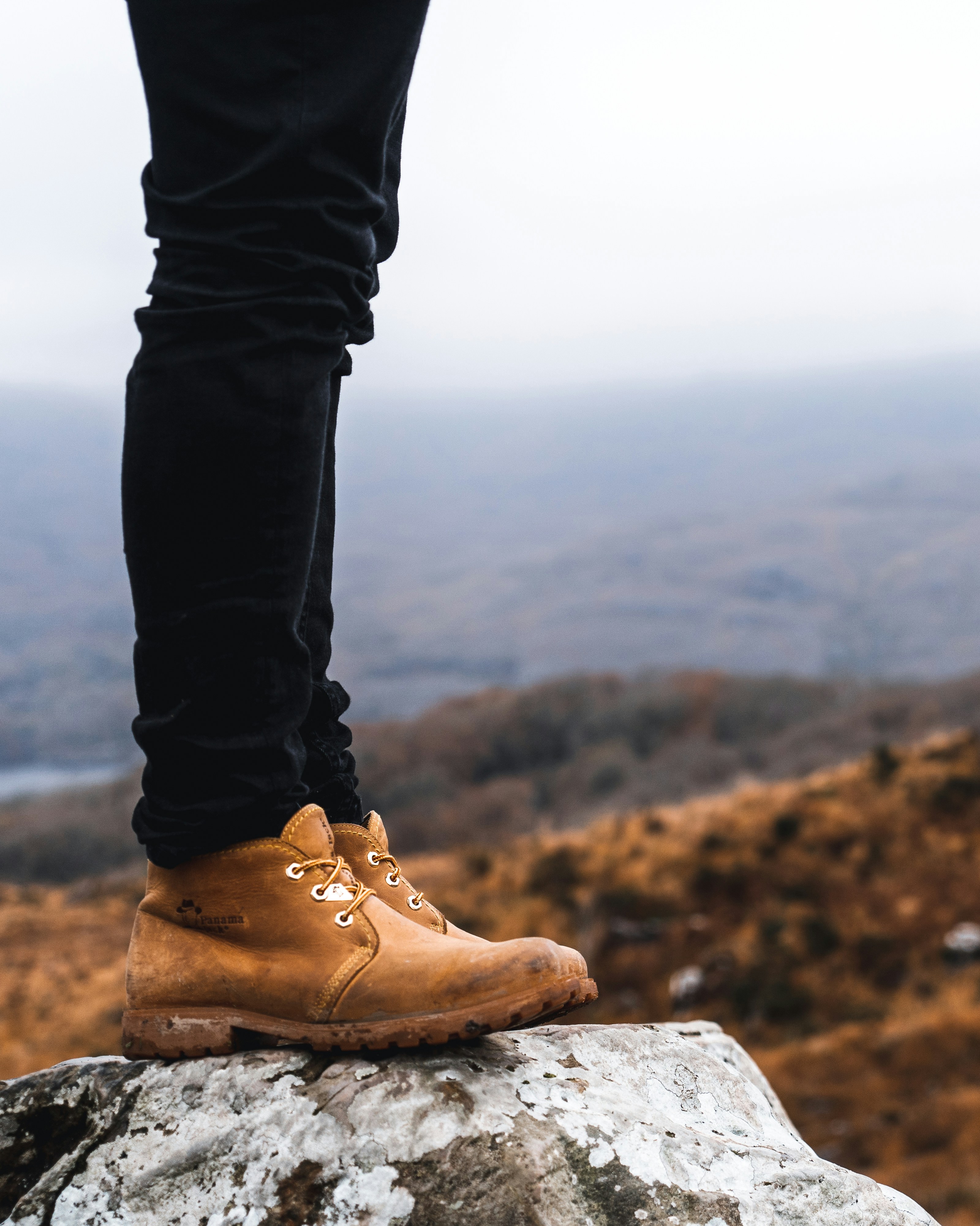 person standing on rock