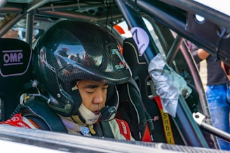 man inside racing car