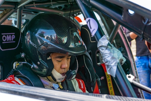 man inside racing car