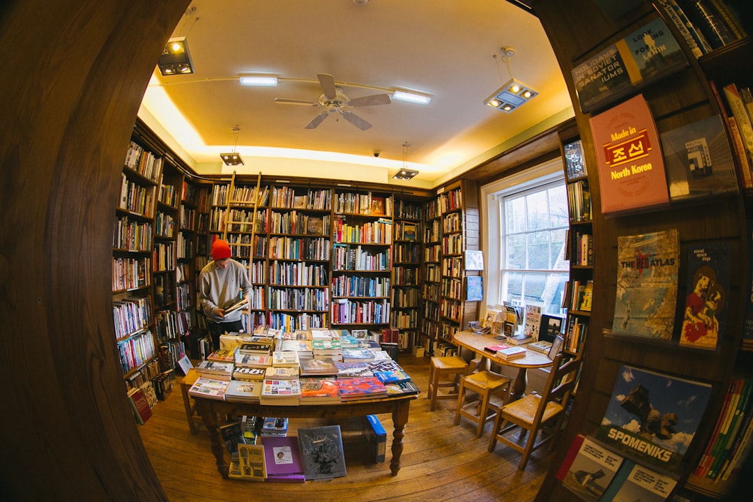 peephole view of man inside library