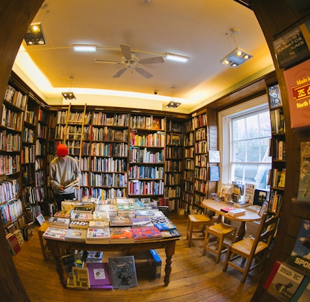 peephole view of man inside library