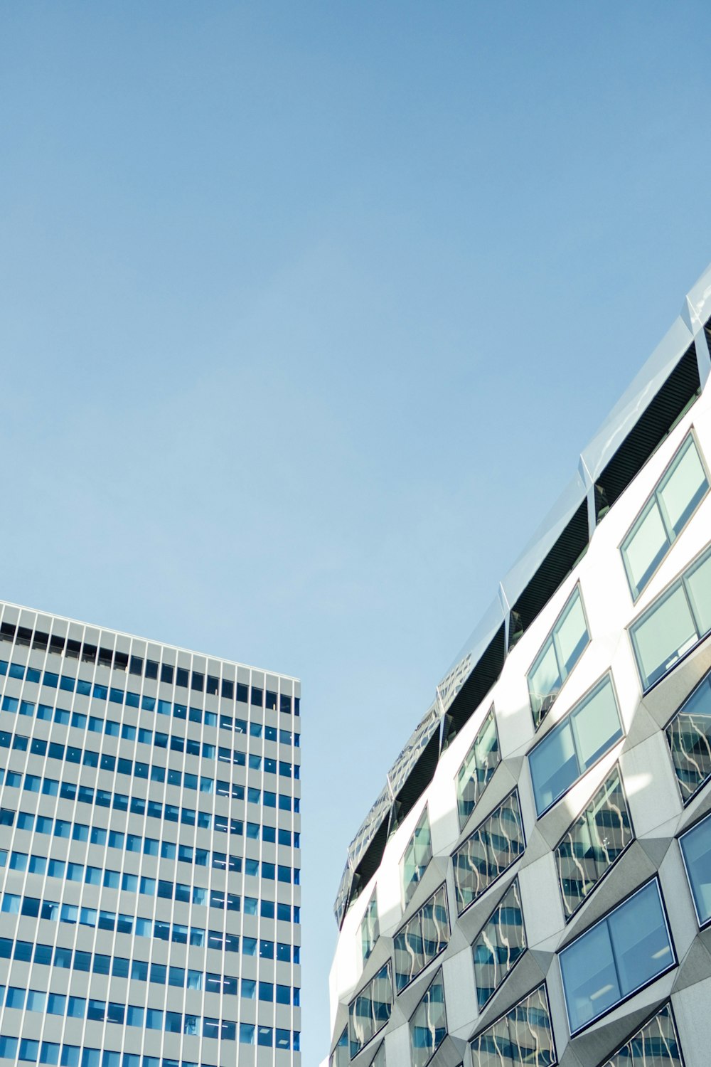 gray and blue high-rise building