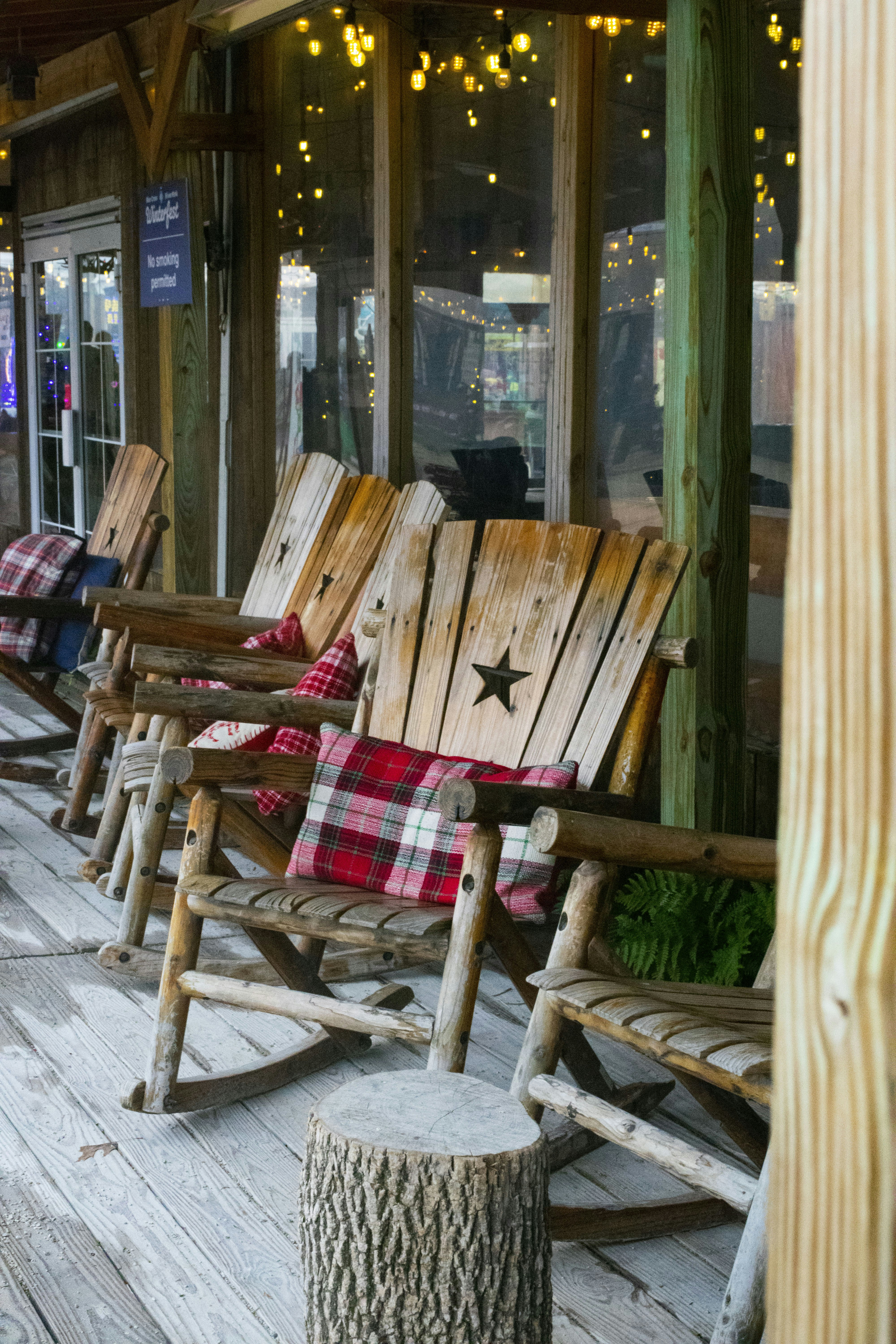 brown wooden Adirondack chairs