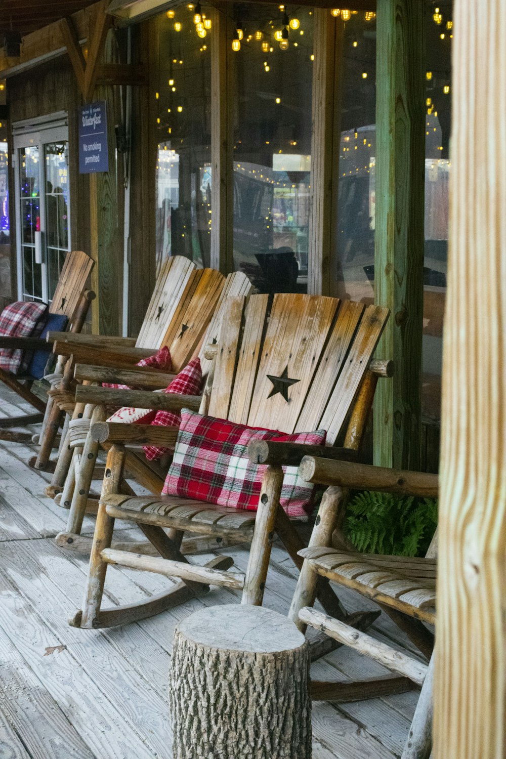 brown wooden Adirondack chairs