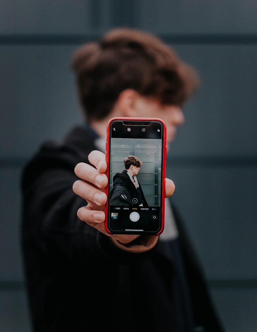 Holding an iPhone