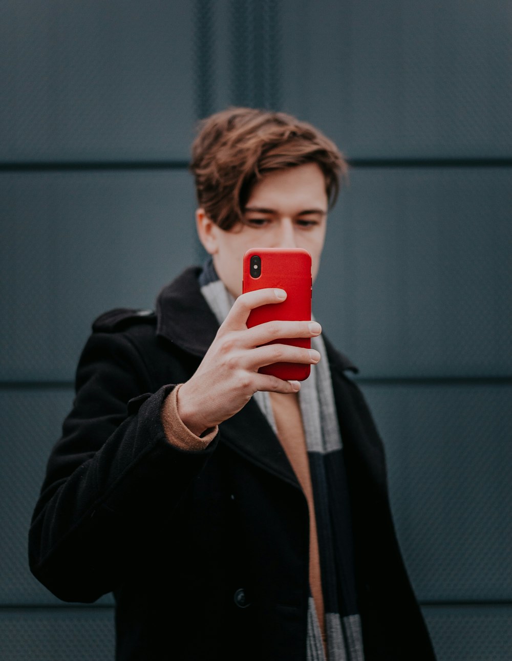 man holding iPhone