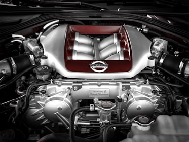 grey and red vehicle engine view