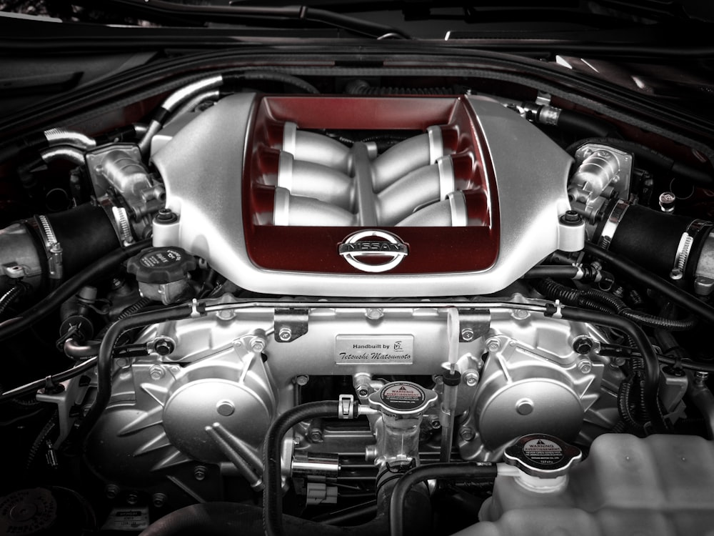 grey and red vehicle engine view