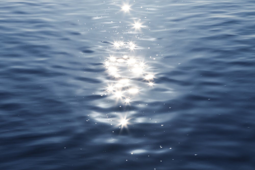 light reflection on blue water