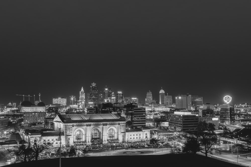 grayscale photo of village at night