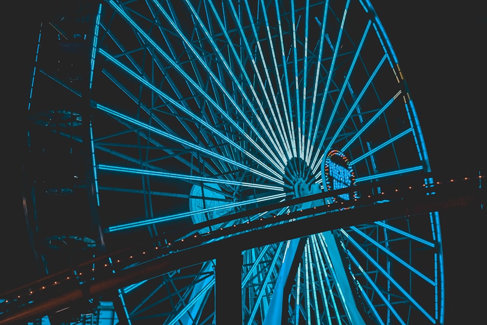 blue Ferris wheel at night