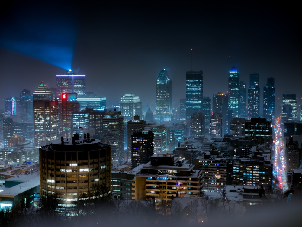 lighted high-rise buildings at nighttime