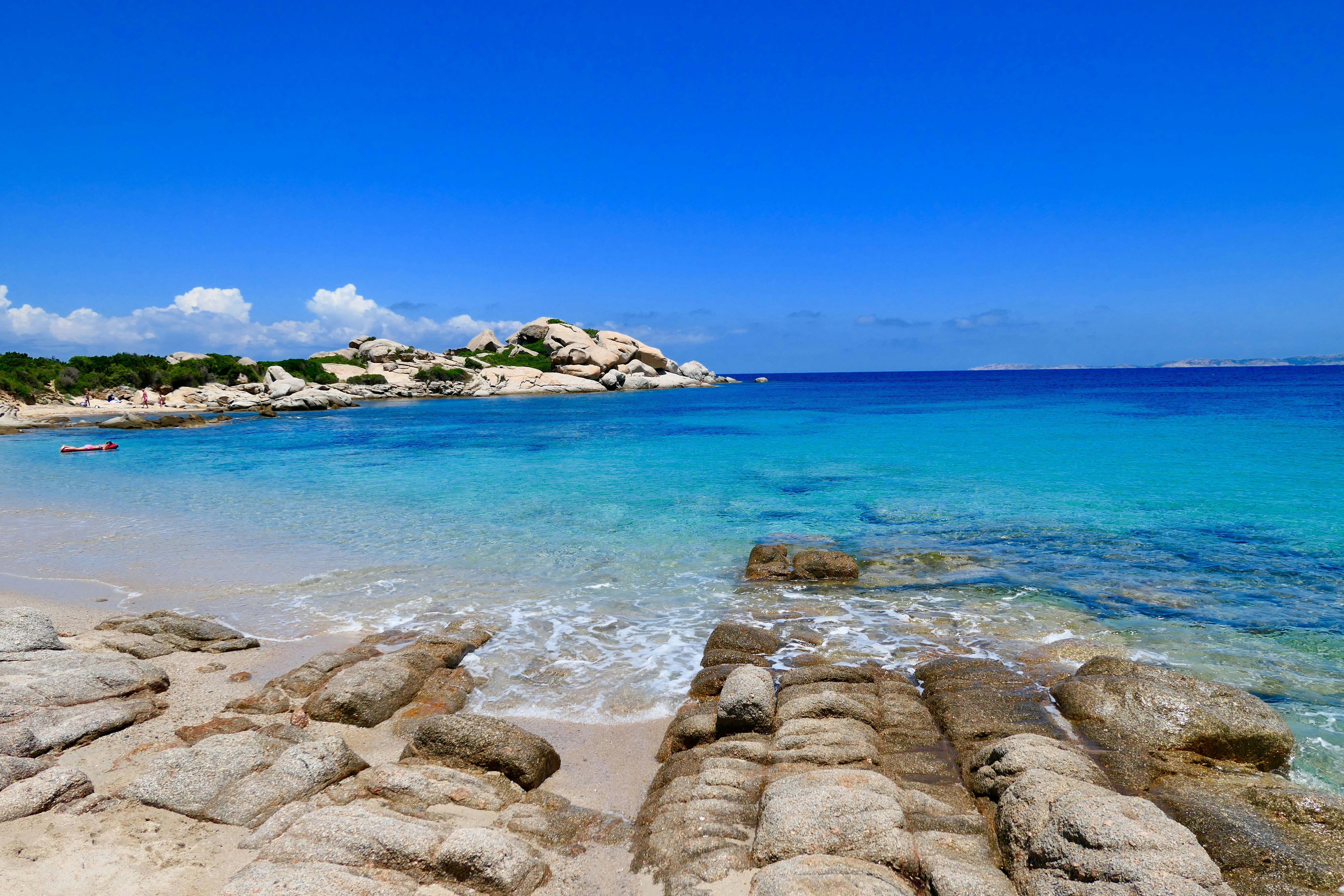 nature photography of rocky shore during daytime