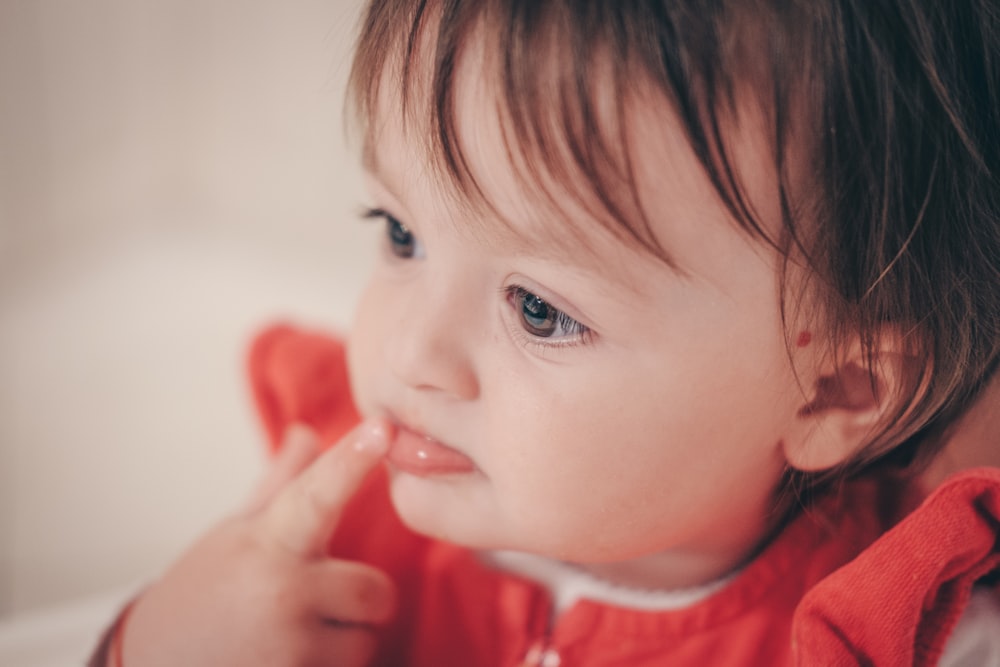 selective focus photography of toddler