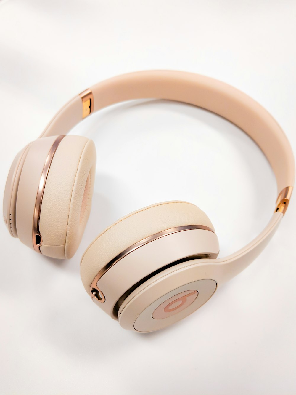 gold Beats wireless headphones