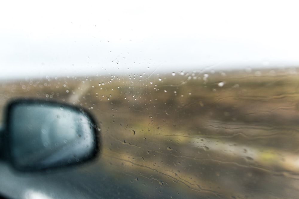vehicle window with water droplets