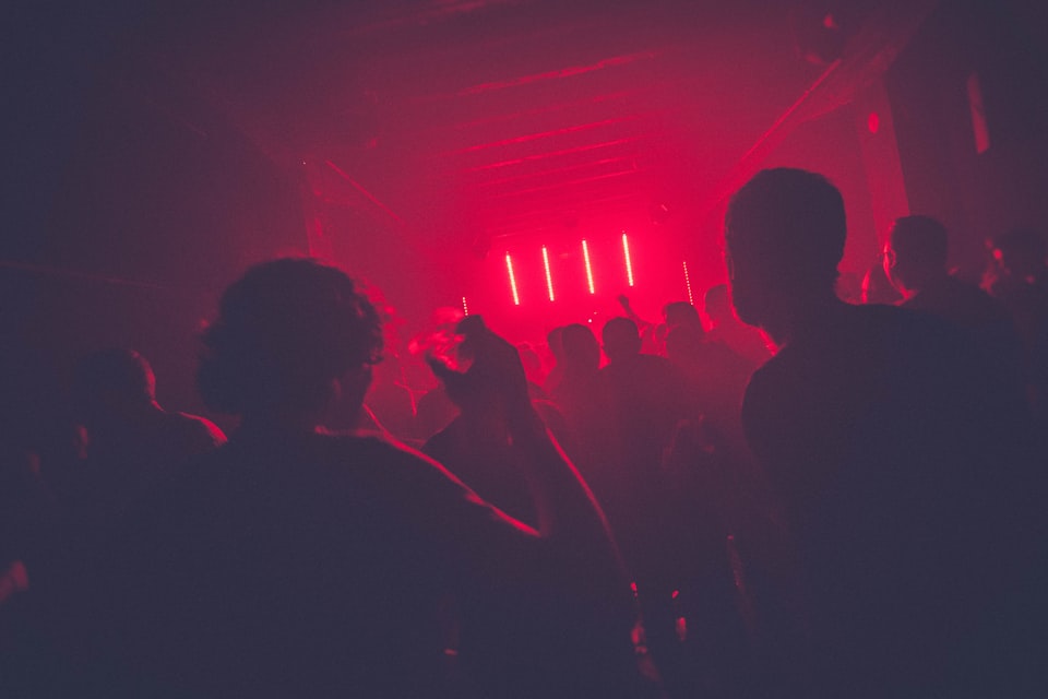A crowd attends a rave.
