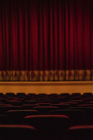 Rows of empty theater seats, like the ones left quiet when a Las Vegas residency show is canceled