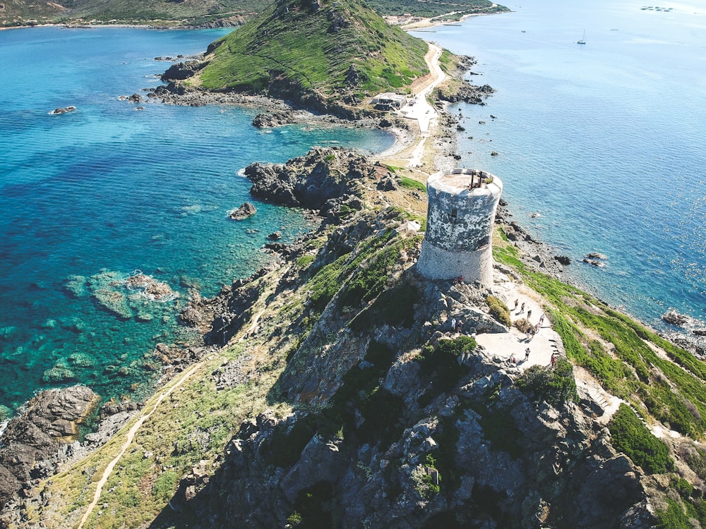 aerial photography of beach cliff and sea view