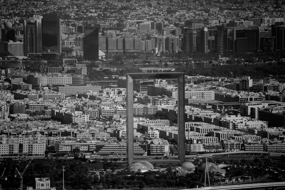 grayscale photo of city buildings