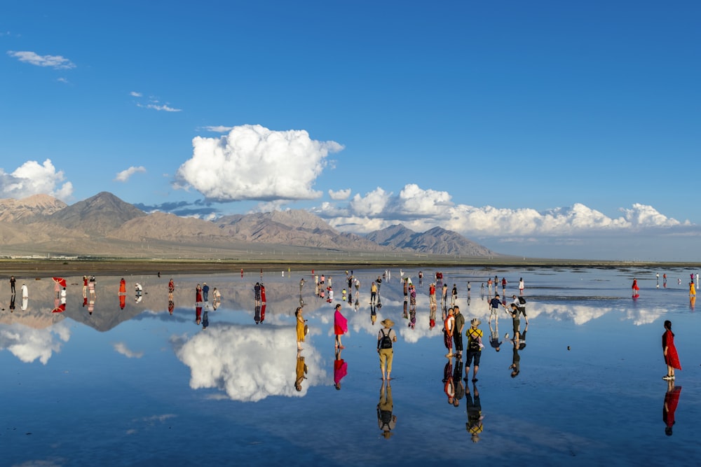 people standing on water