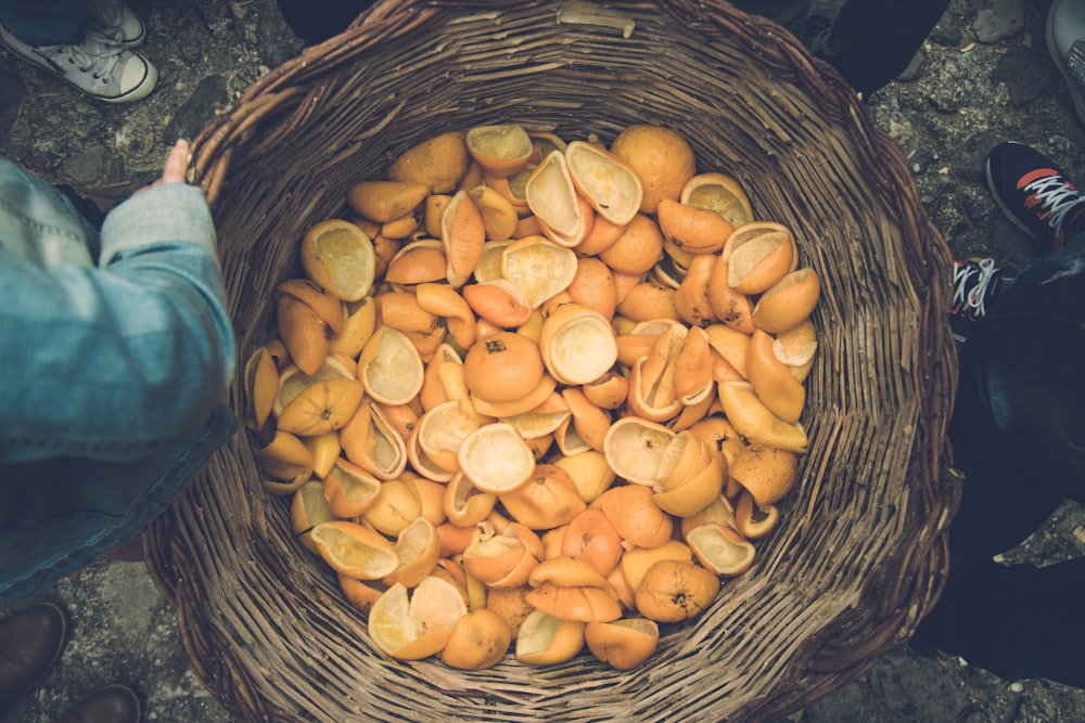 orange fruit peels in basket