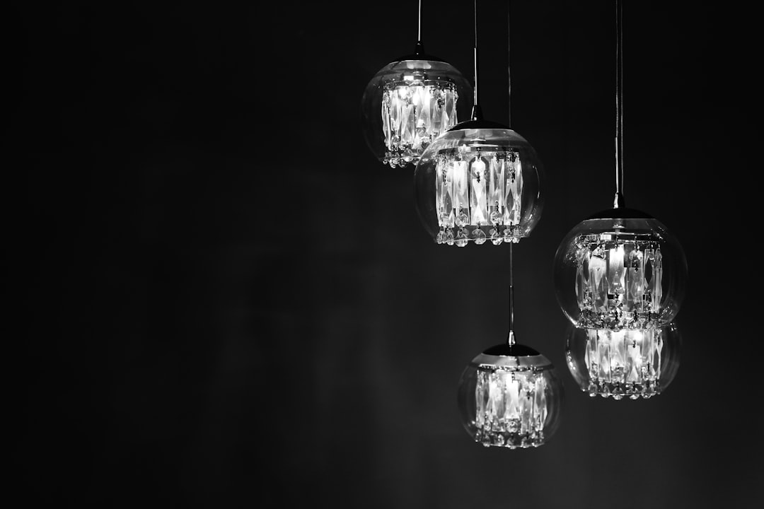  close up photo of clear glass ornaments chandelier